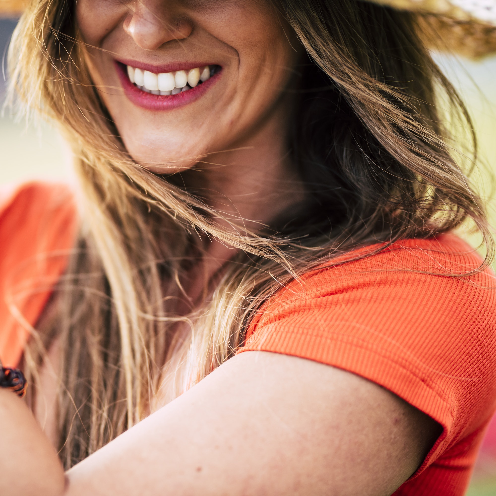 Close up portrait of attractive brunette smile with perfect teeth